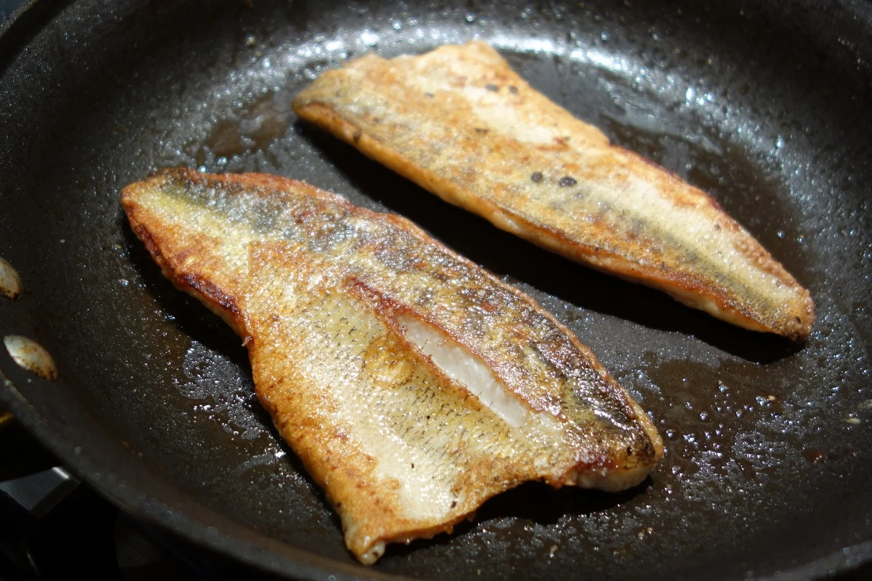 Finish cooking, skin up, until the internal temperature is 130F.