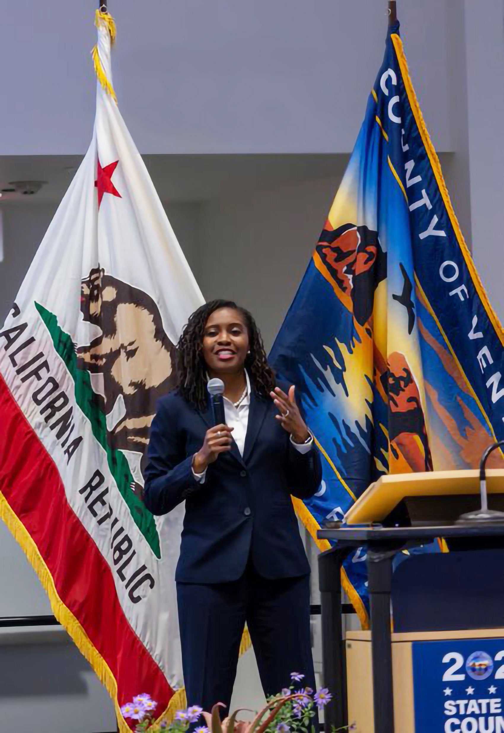 Ventura County Chief Executive Officer Dr. Sevet Johnson with the new Ventura County Flag.