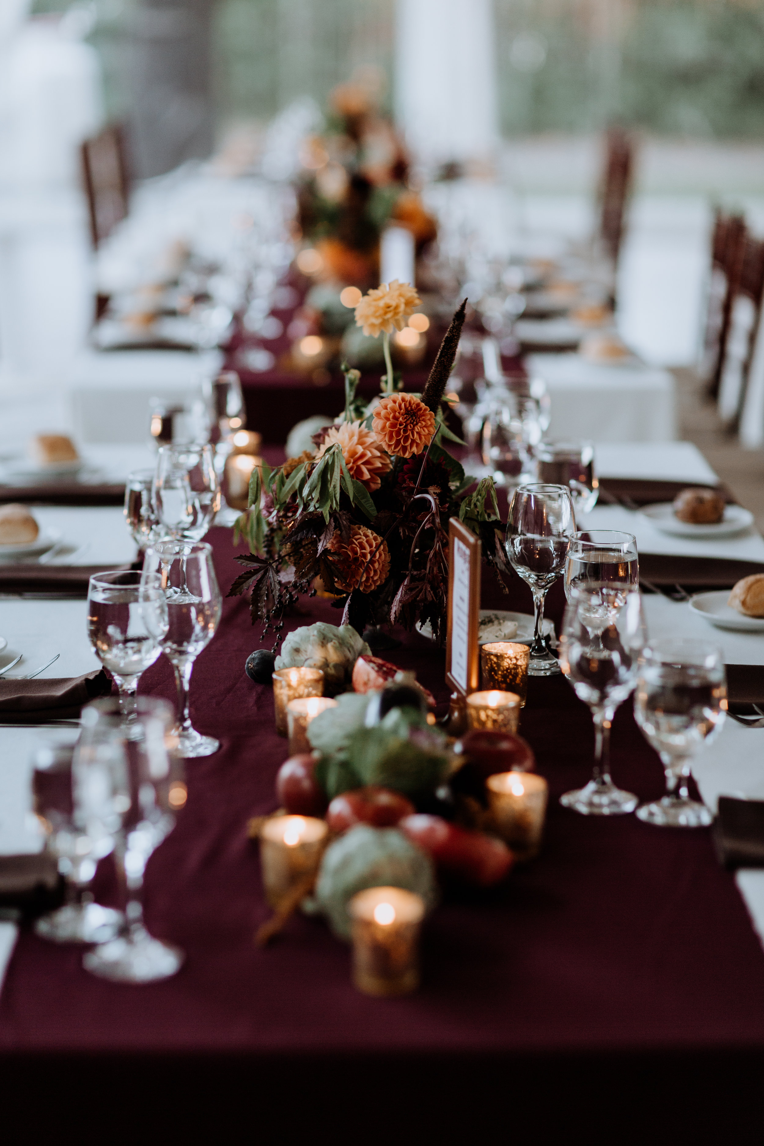 dinner tables decorated with fruits and vegetables (that guests took home!)