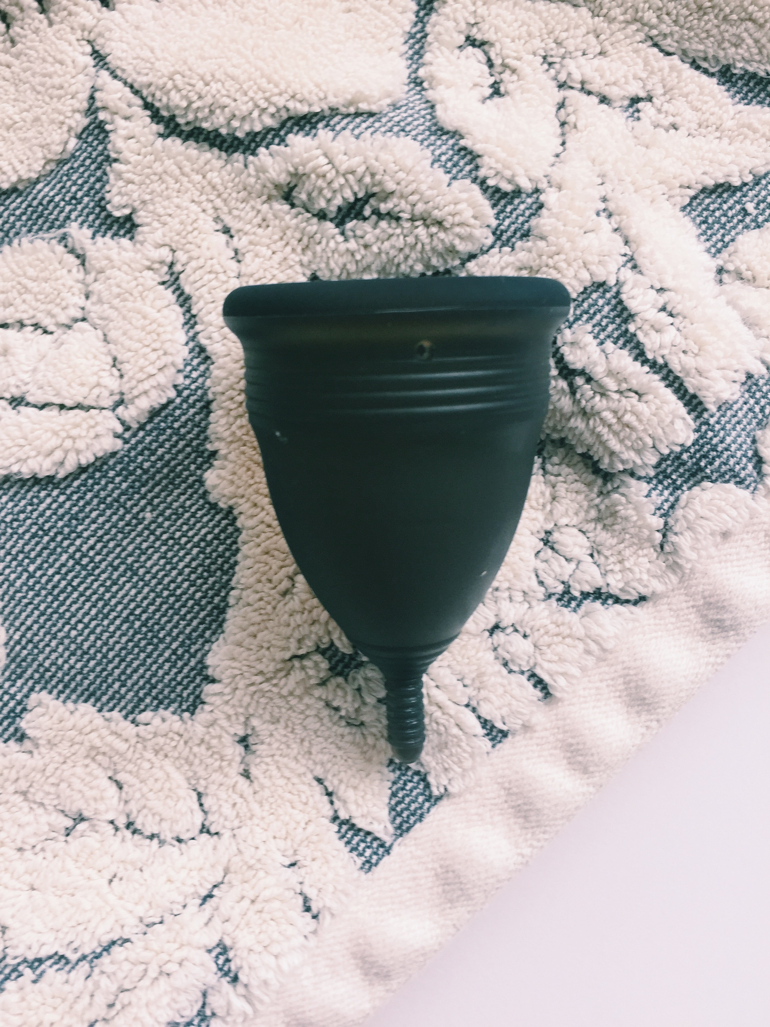 a menstrual cup as black as my soul. 