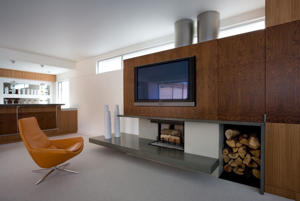 The upper family room / bar. A blend of woods and concrete to warm you up.