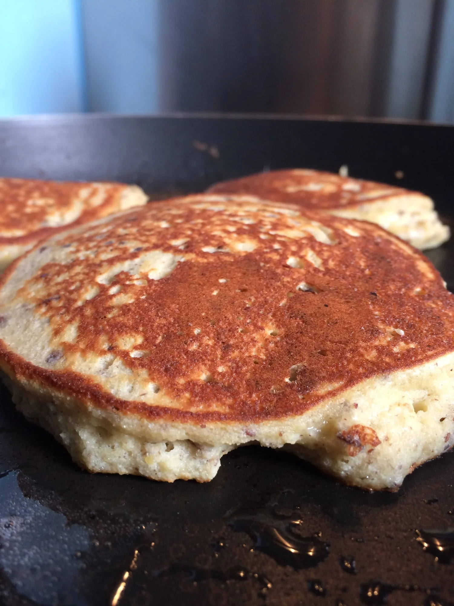 Buckwheat pancakes fluffing up nicely in the pan.