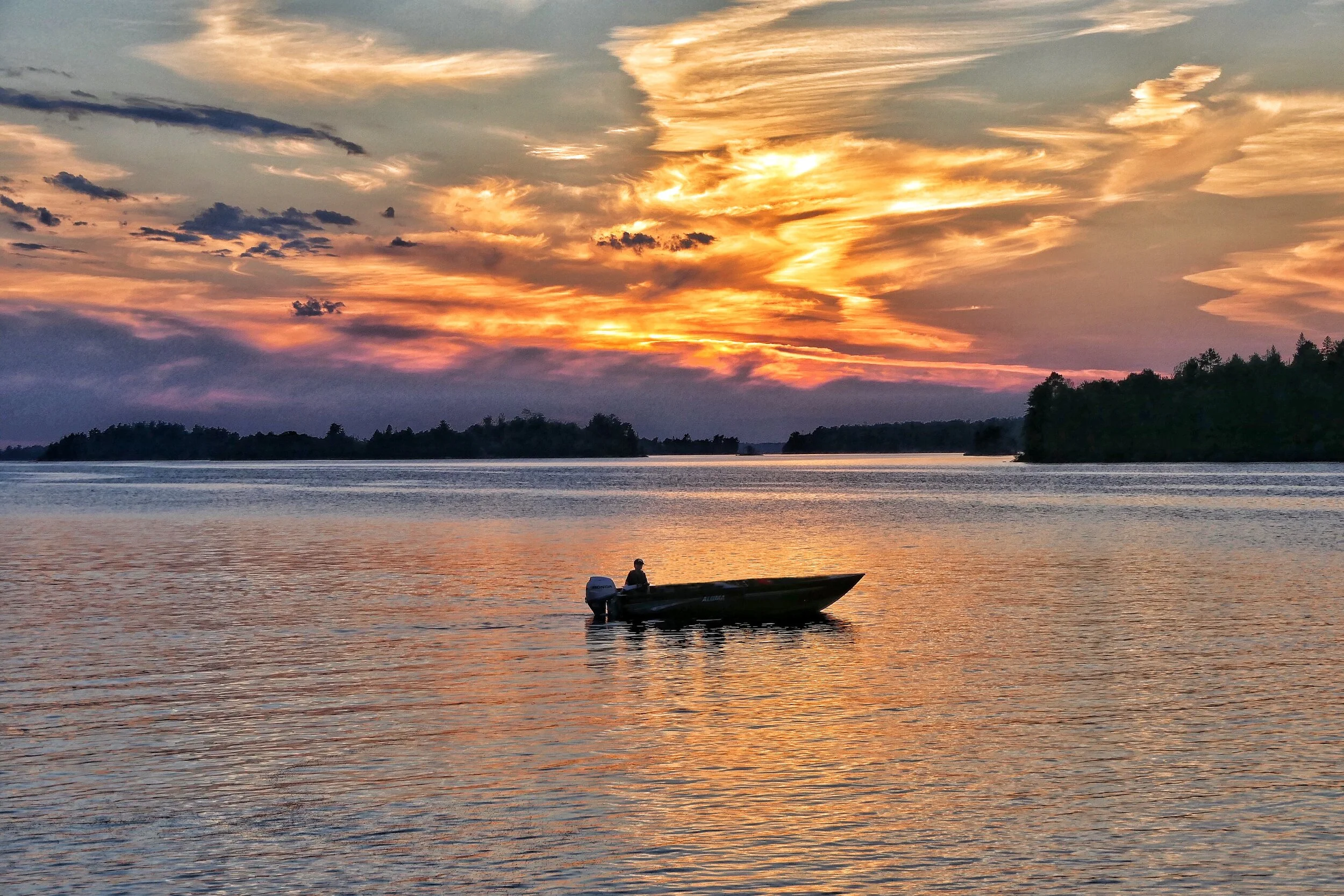 Jeff LaVigne_Boat_in_the_Summer_Sunset.jpg