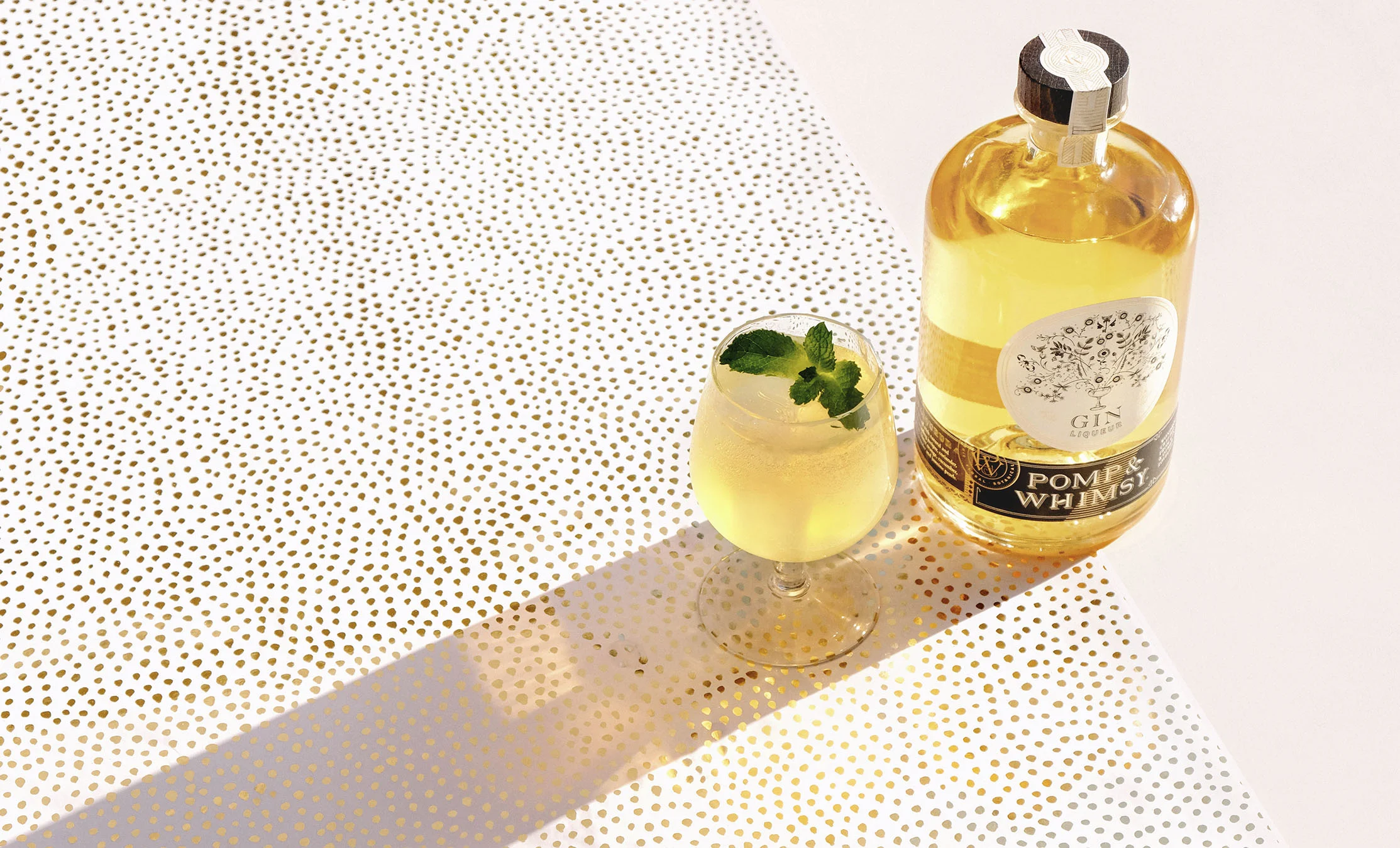 A FINE FILLY 1½ oz Pomp & Whimsy ¾ oz ginger syrup ½ oz lime club soda Add all ingredients to shaker and shake for 10 seconds. Strain into glass and add club soda. Garnish with a handful of mint.
