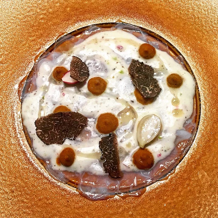 Spanish octopus carpaccio, citrus vinegrette, coffee oil