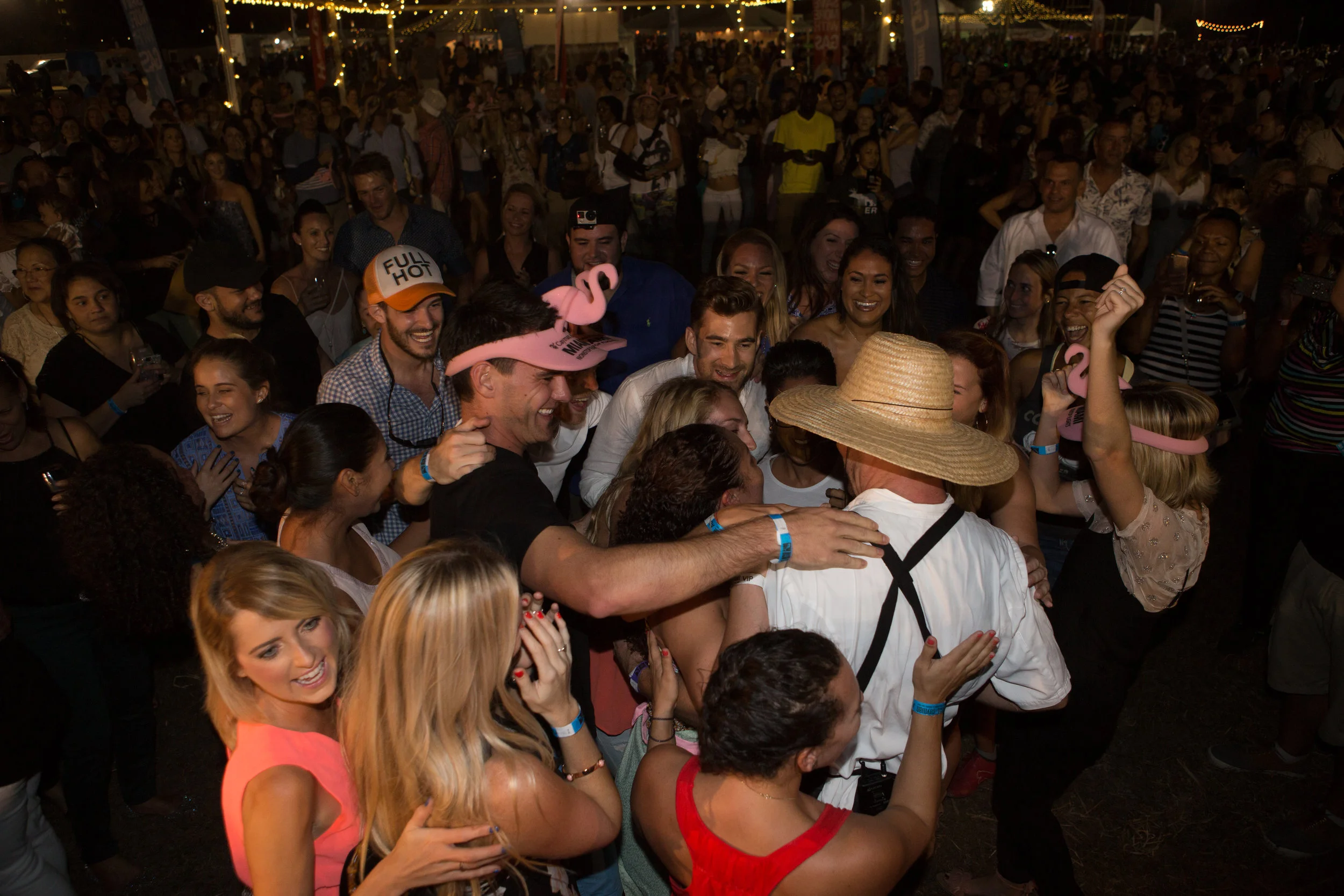 Swarmed by a flash mob of friends in a crowd of hundreds Photo credit: Chad Munro of Picture This Studios