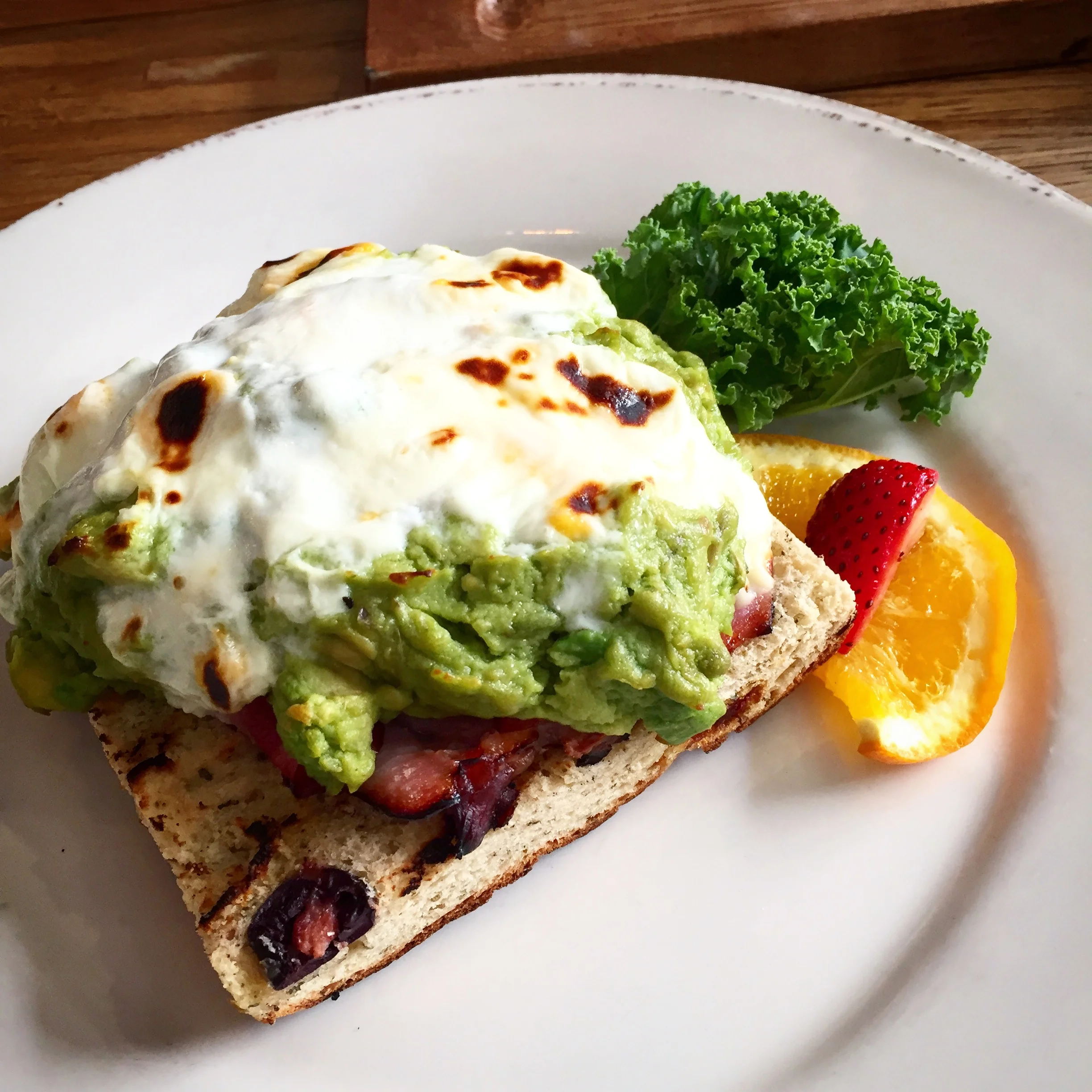 One of the "On Bread" items, the Avocado Bake . I went for a gluten-free focaccia bread topped with crushed avocado, smoked ham and a blend of melted cheese and eggs. Dam I need this to happen in Cayman!