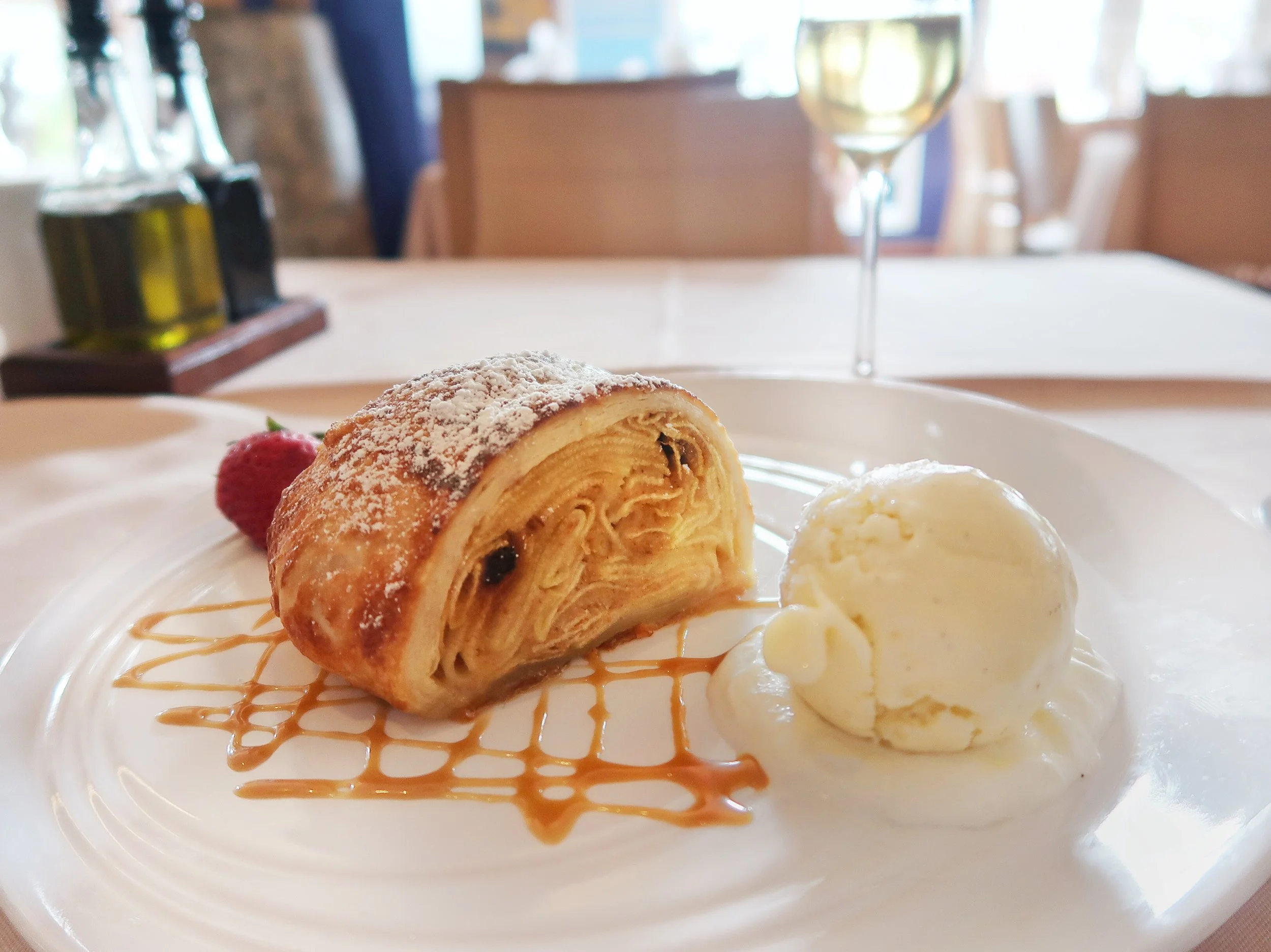 One of the most popular desserts at Ragazzi is the Hot Apple Strudel - thinly sliced apples, raisins and pine nuts wrapped in puff pastry and served with toffee sauce and a scoop of vanilla ice cream.