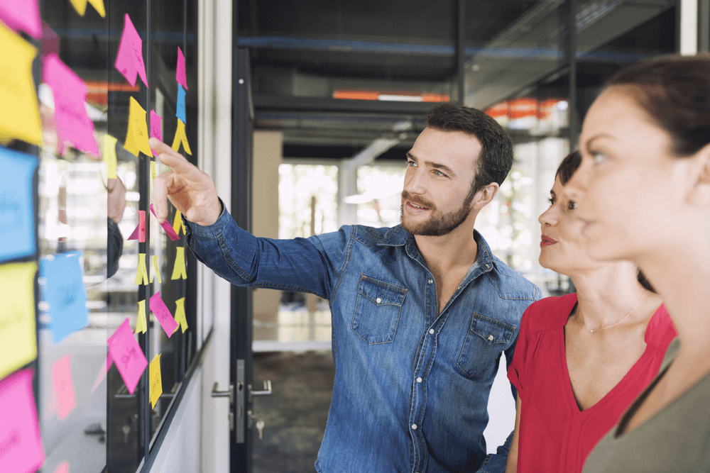 businesspeople_discussing_planning_meeting_optimized_shutterstock_490695220.png