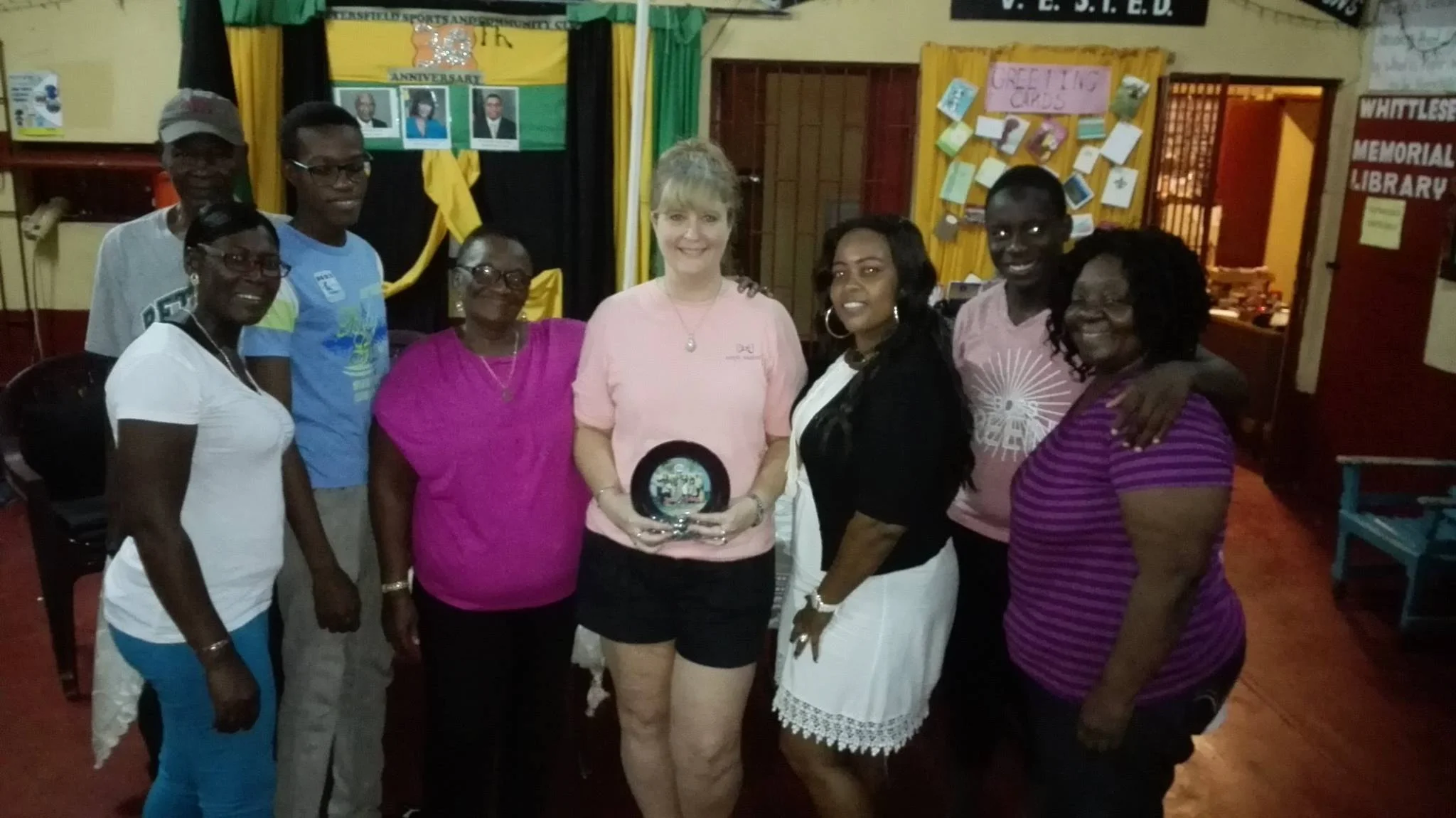 My new family. Mahhhhhhhhhhhhhhh (my Jamaican mom) is on the end with the purple striped shirt.