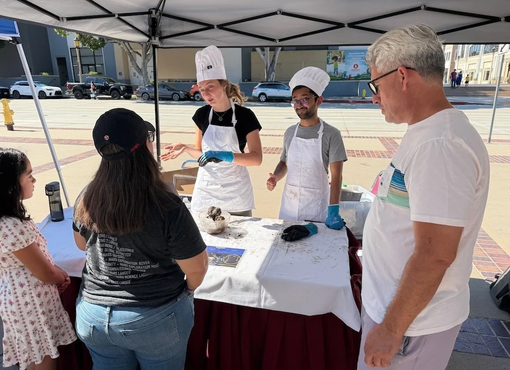  Caltech Astro and Cal State Los Angeles volunteers in toques and aprons whipped up cometary nuclei out of household ingredients and dry ice. Image: Cameron Hummels 