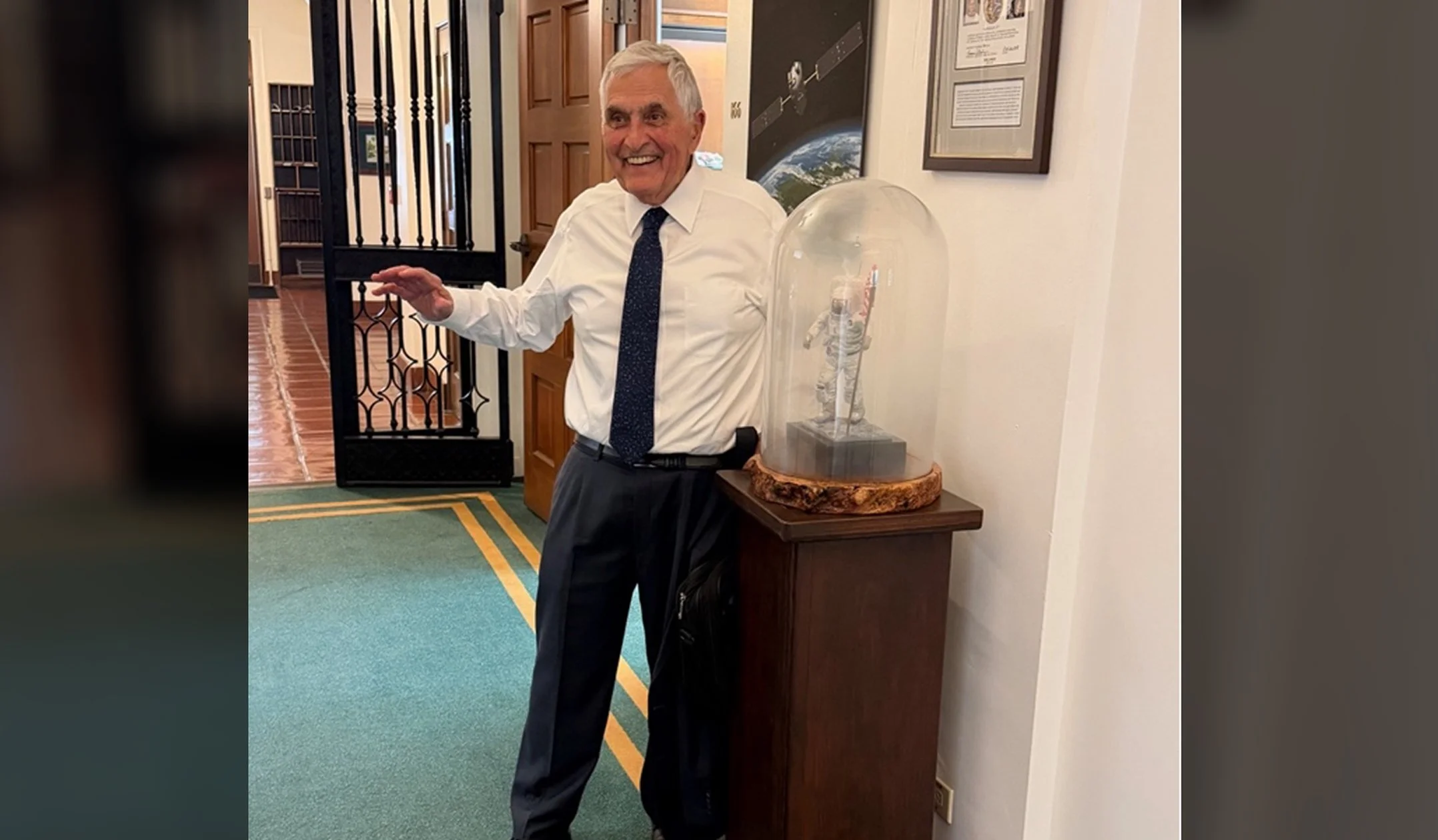   Schmitt visits the Division of Geological and Planetary Sciences and poses with a statue of himself modeled after his moonwalk on the Apollo 17 mission. Credit: Cameron Hummels  