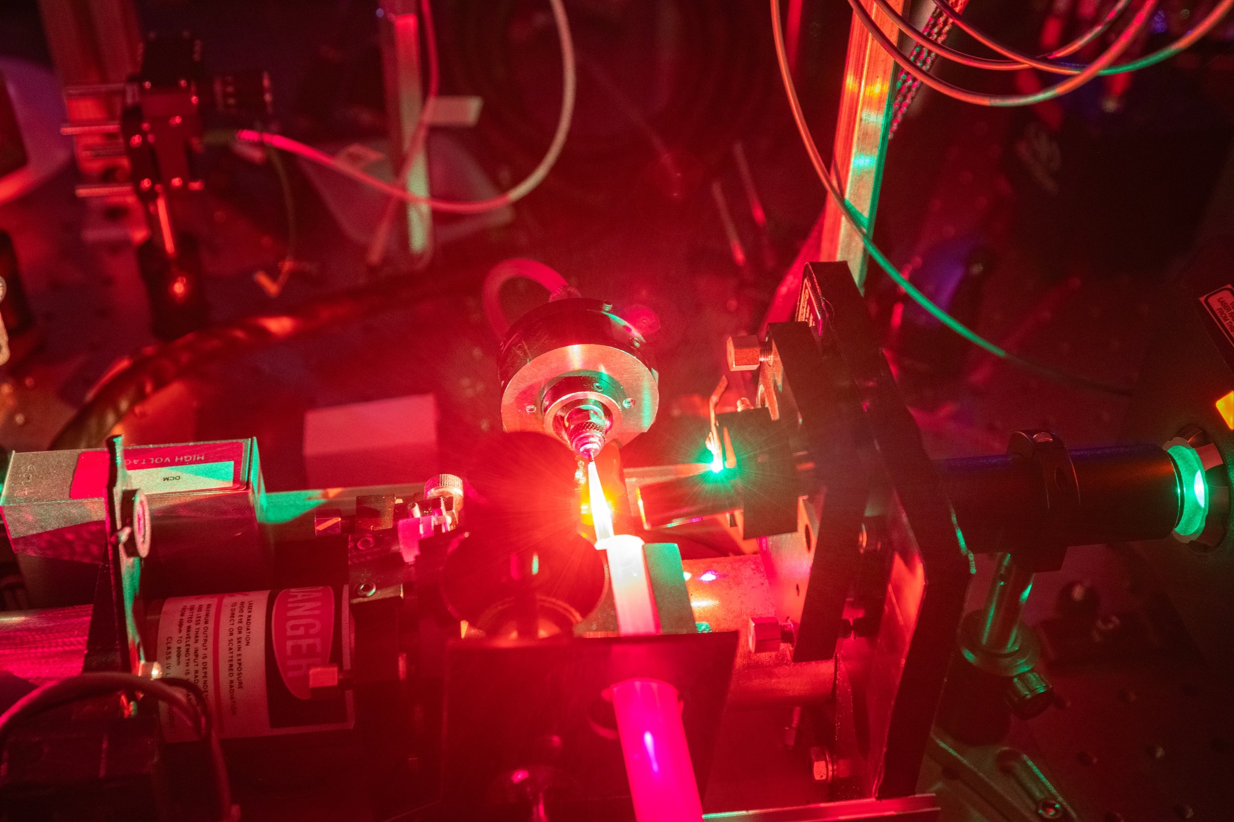 How Tabletop Quantum Experiments Could Answer the Question of Why We Exist
