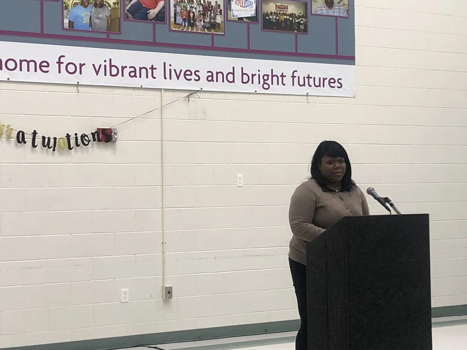 2016 Make Your Money Talk graduate Jasmine Rolland shares her story with the audience. (Picture by Nyesha Stone)