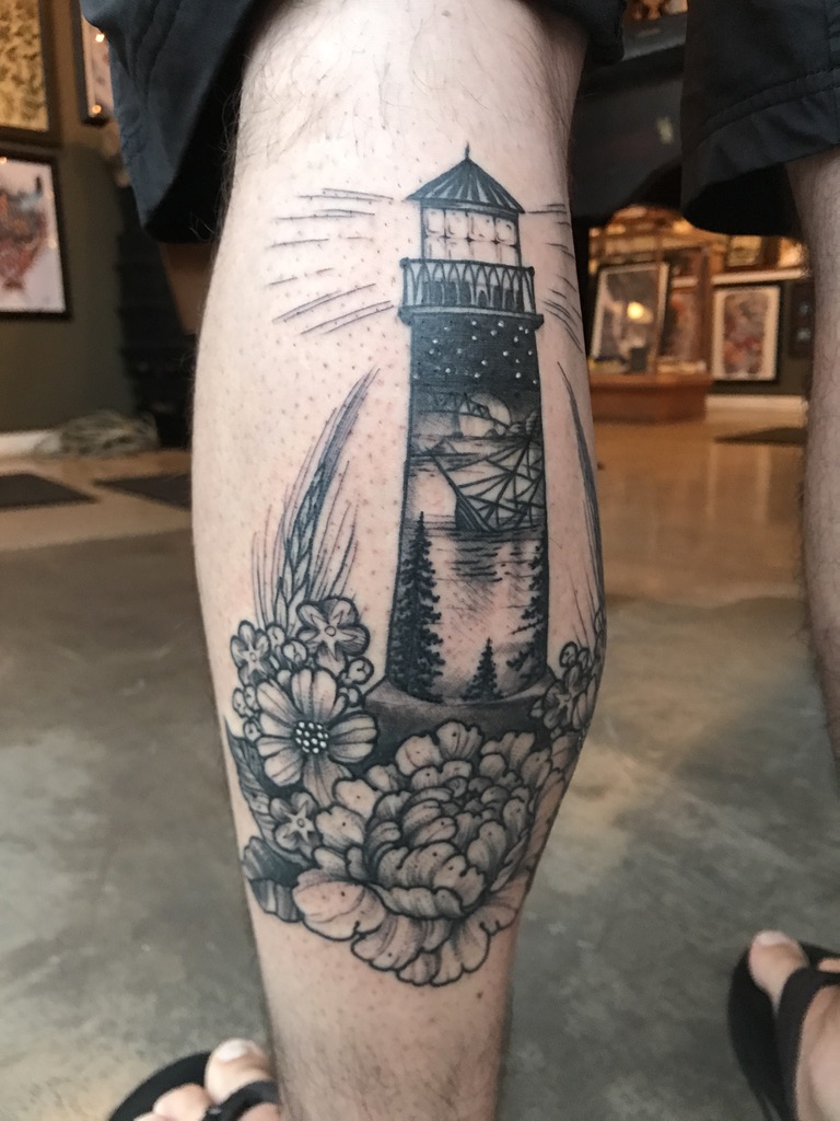 lighthouse  and flower tattoo