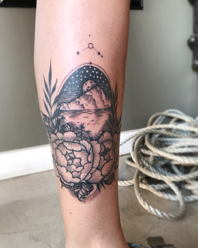 constellation and mountain scene tattoo