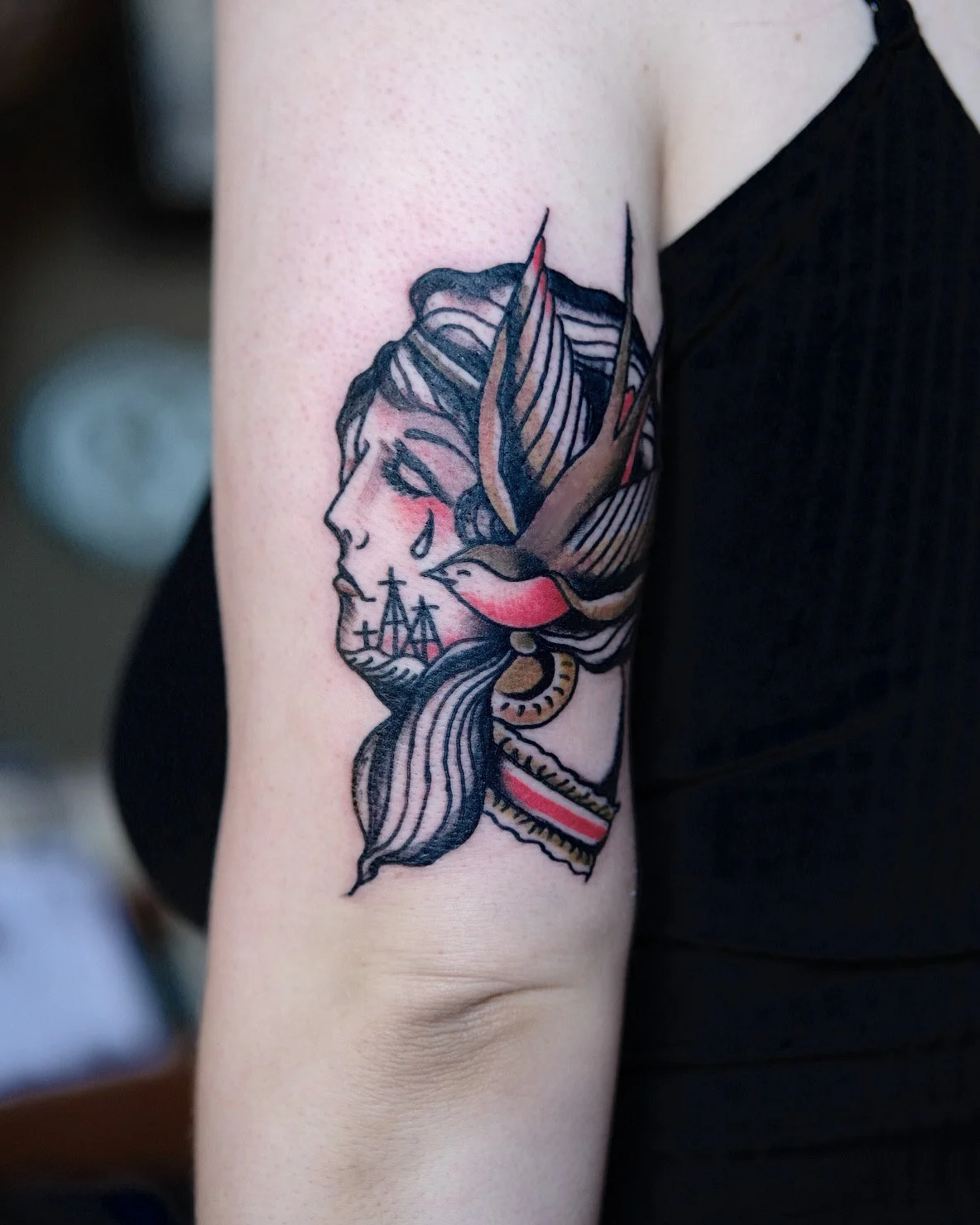 Traditional arm tattoo