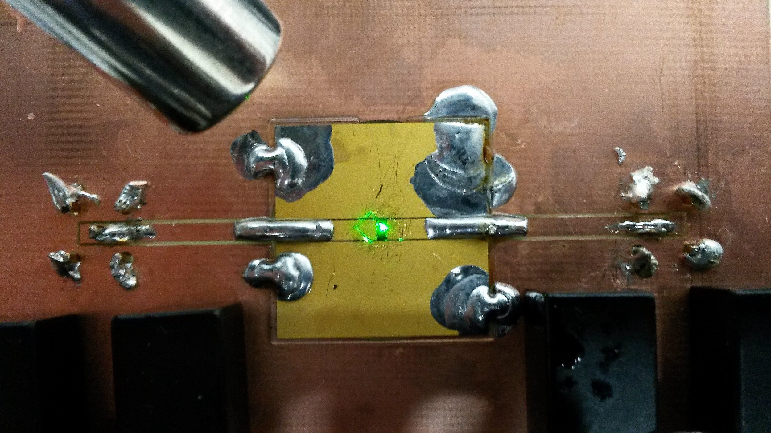 Excitation of shallow NV centers