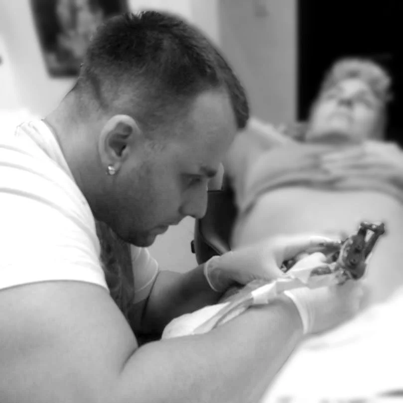 Igor Hadji Daovski tattooing a client at IH Tattoo Studio in Mississauga, Ontario