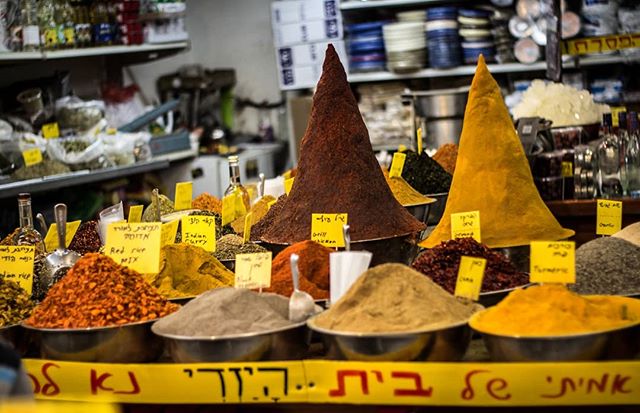 &quot;We wandered the bustling Mahane Yehuda market, nibbling on dates and olives, gawking at the impossibly-tall spice towers, sampling pinches of this and that before escaping the persistent hawkers.&quot; Excerpted from my essay on discovering ide