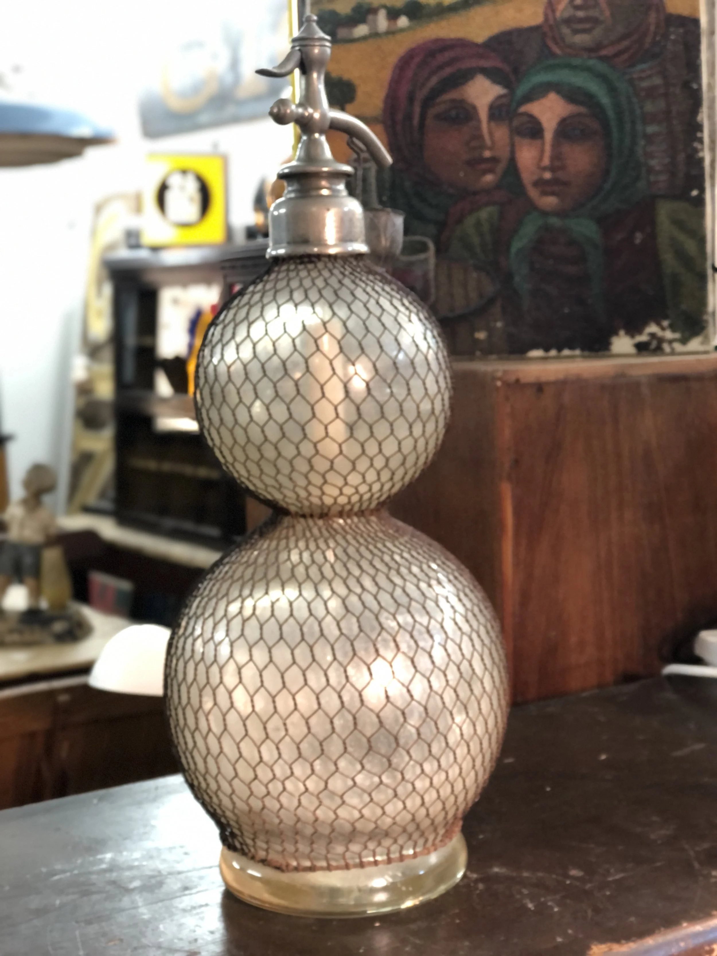 large antique seltzer bottle