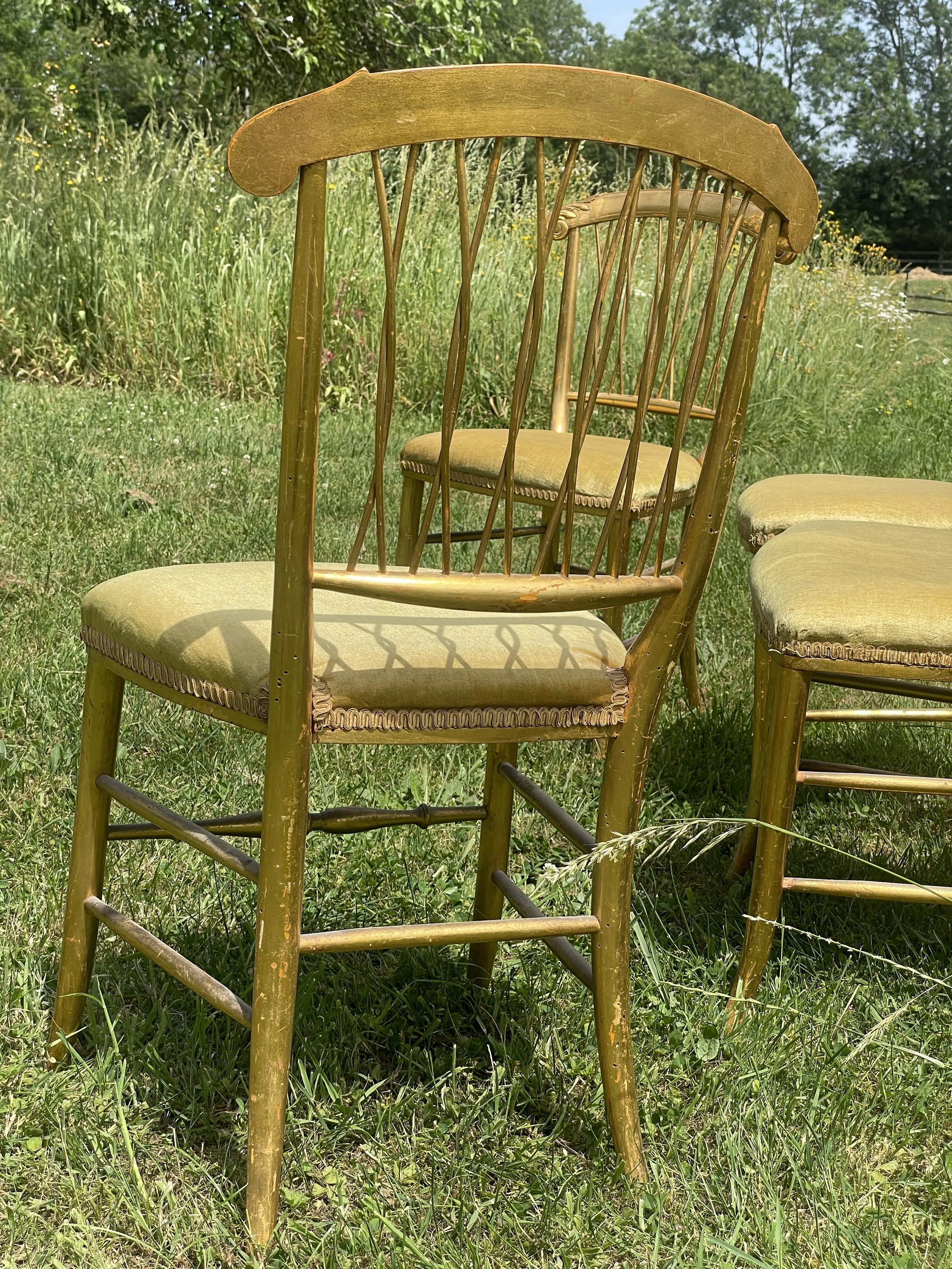 Set of Four French Giltwood Bergère Chairs