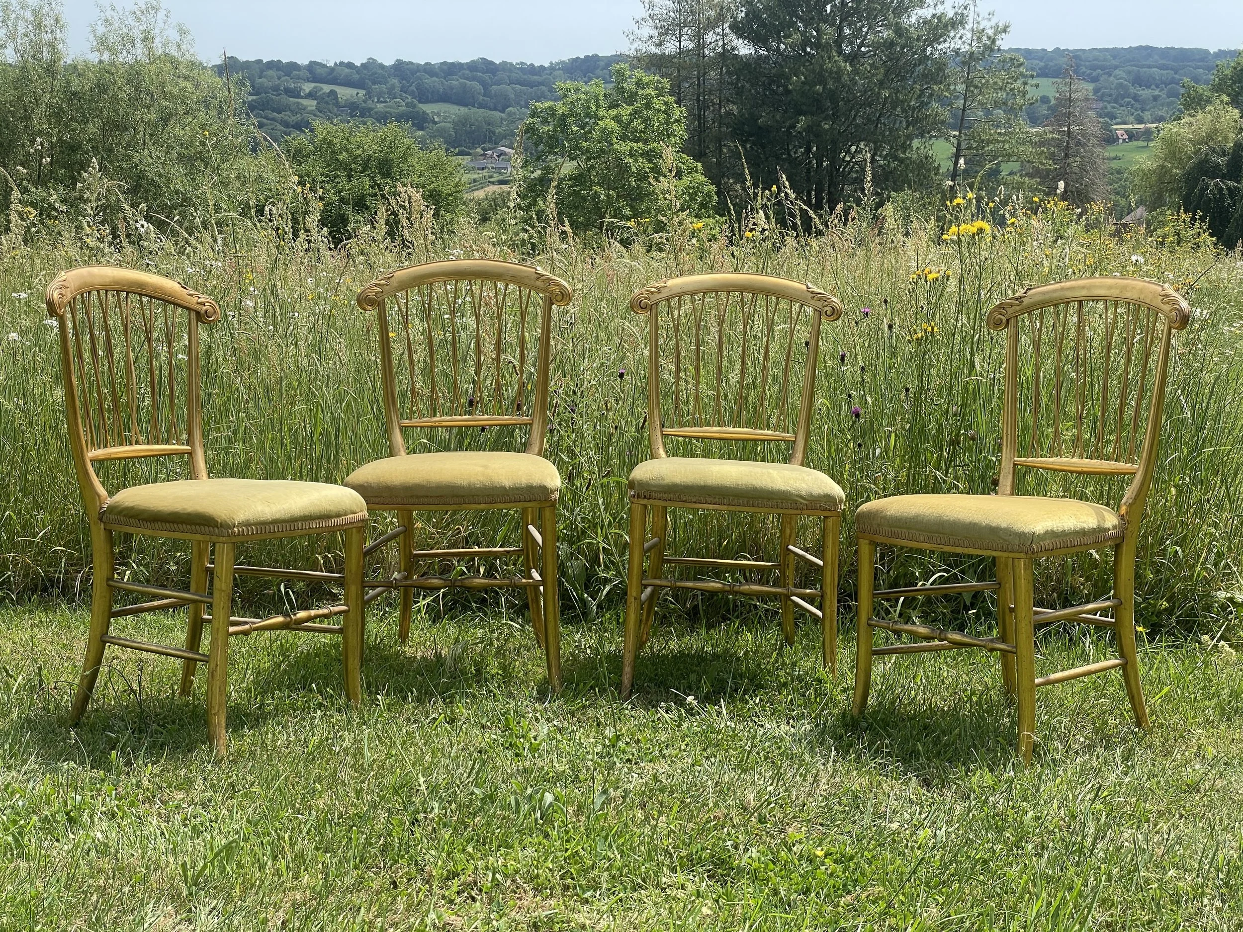 Set of Four French Giltwood Bergère Chairs