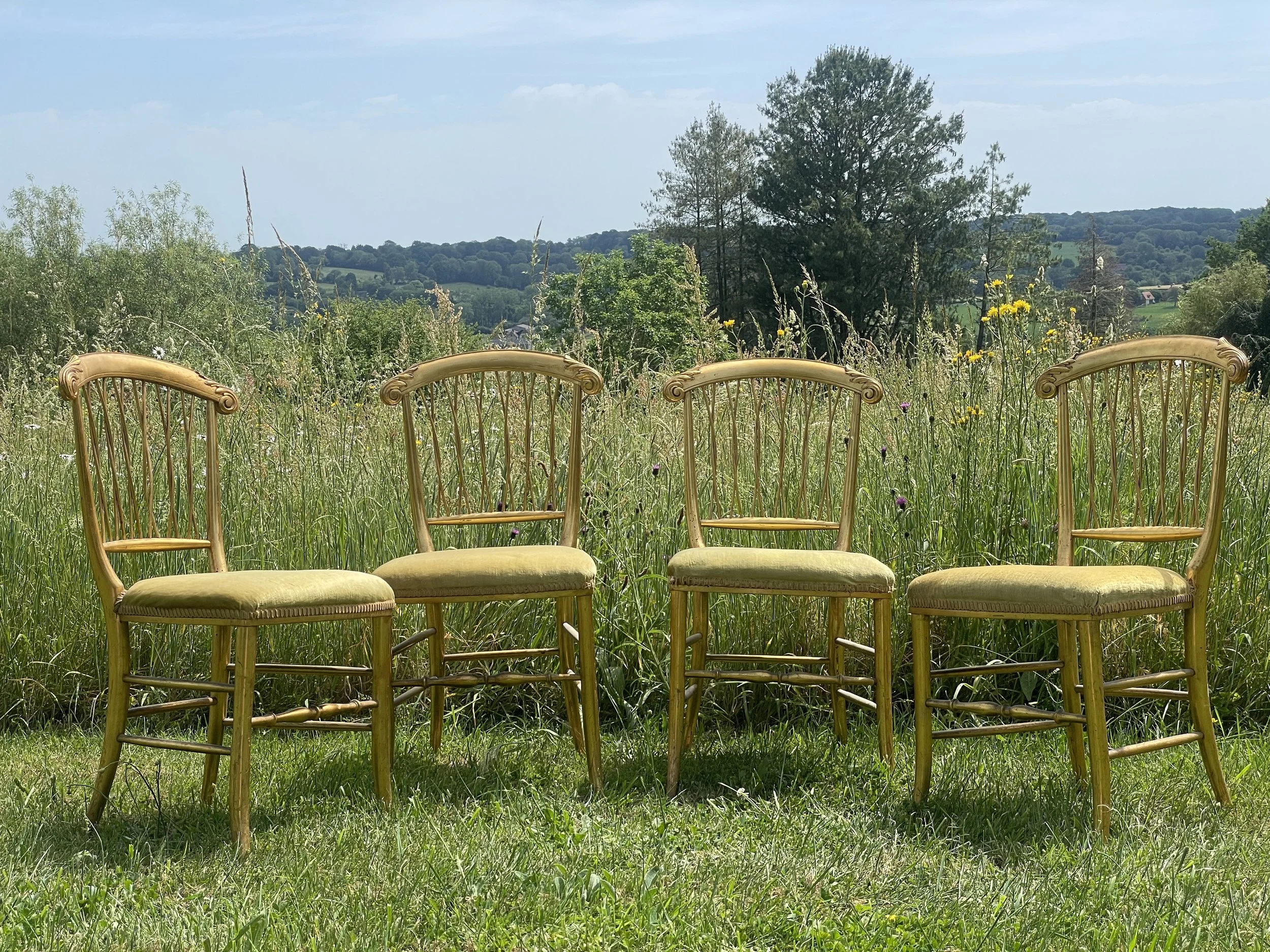 Set of Four French Giltwood Bergère Chairs