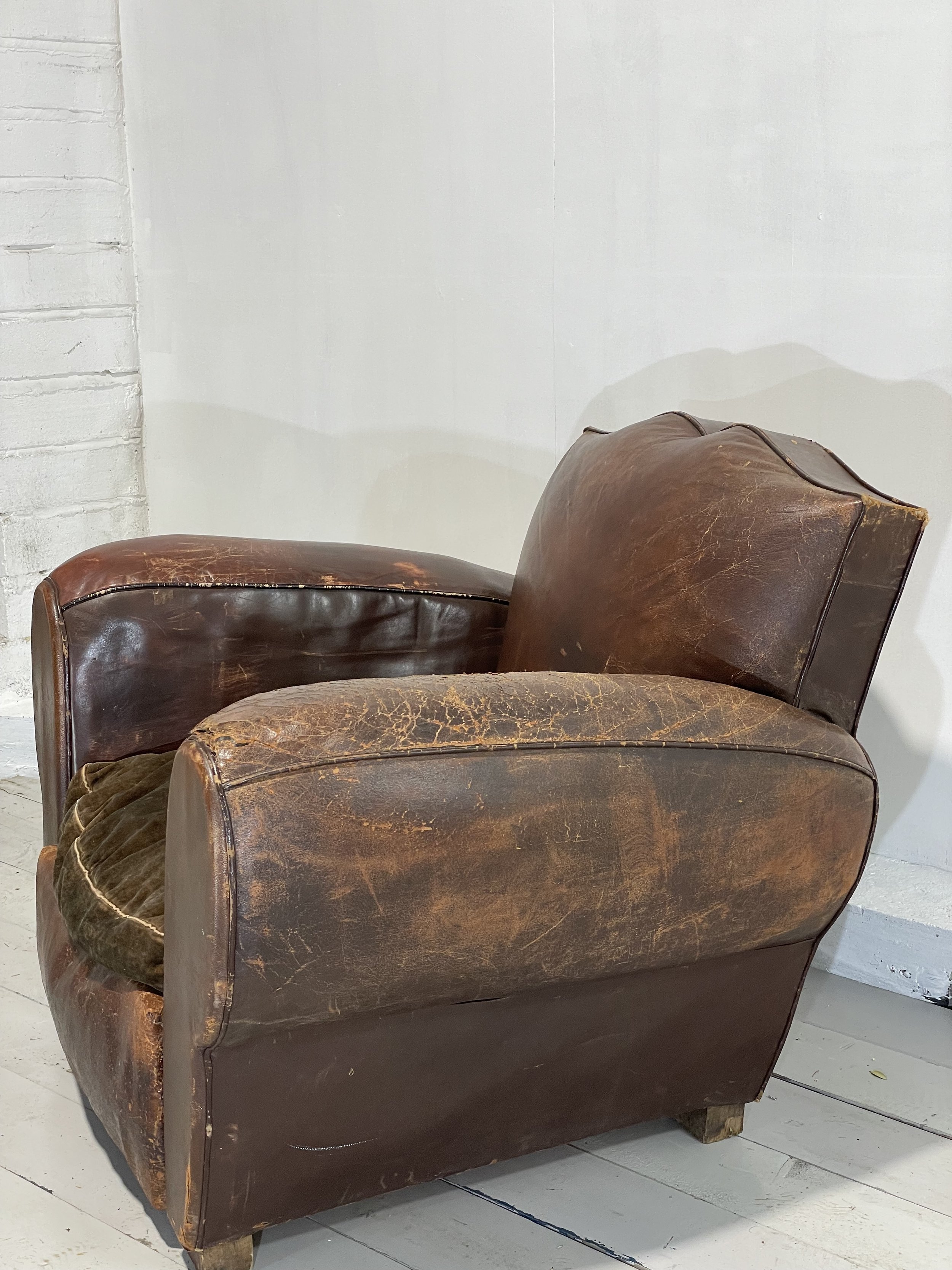 Antique Leather Moustache Chair
