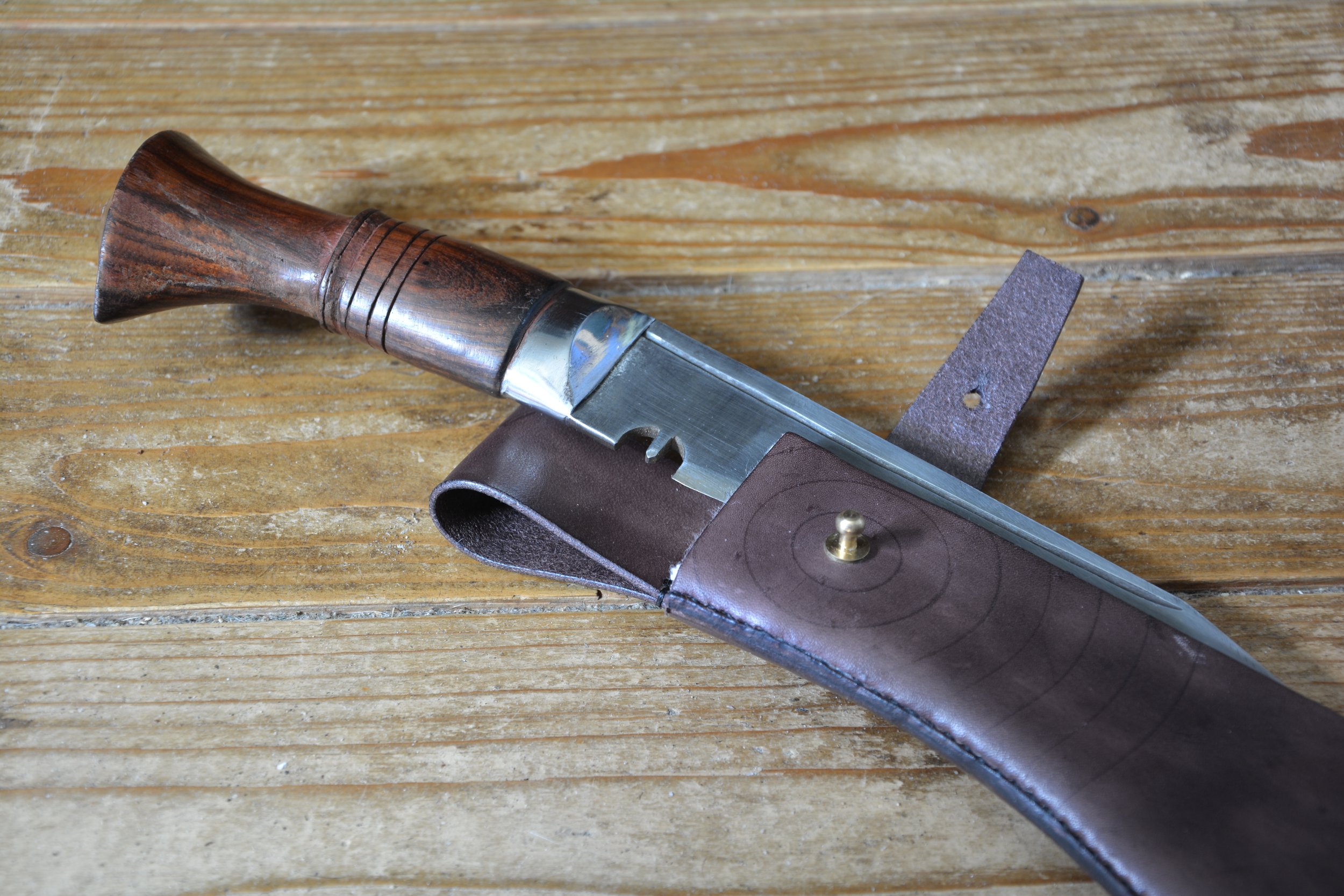 Kukri with open back scabbard, bet loop and stud