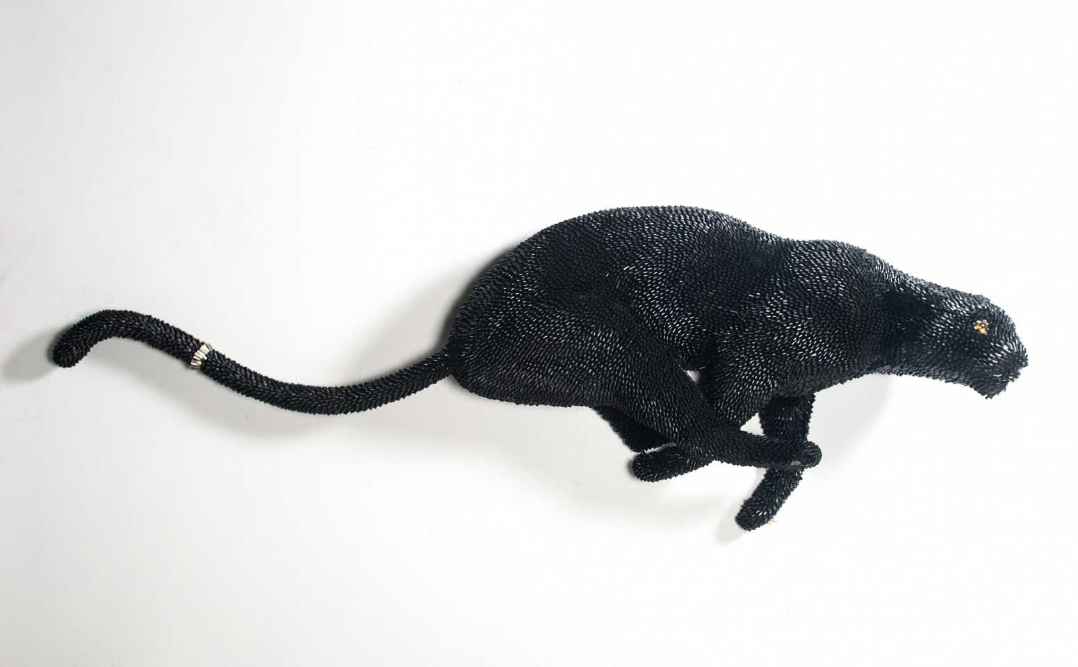 Federico Uribe (Colombian, b. 1962) Black Panther , 2017 Bullet Shells 36 x 72 x 12 in. (91.4 x 182.9 x 30.5 cm)