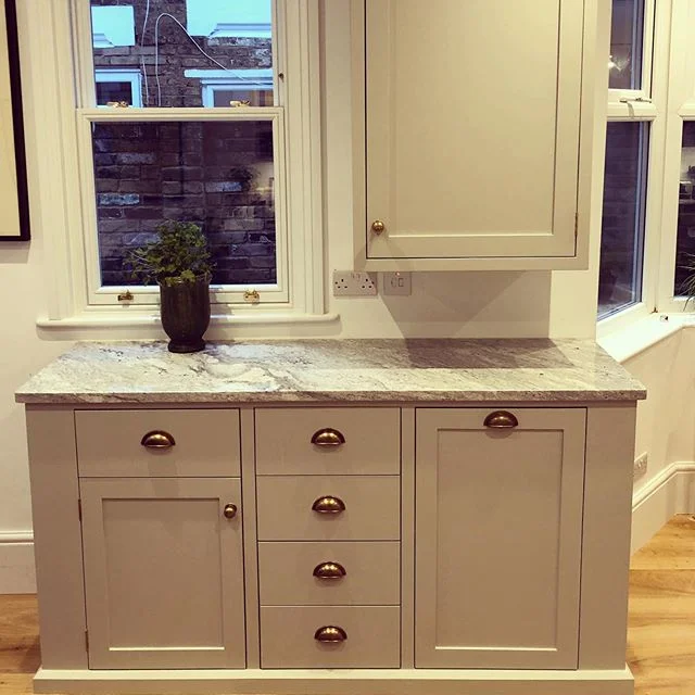 Boiler cupboard with concealed lighting, book shelves, pull out bins (and other units) #shakercabinets #kitchendesign #kitchen #bespoke #carpentry #london #design