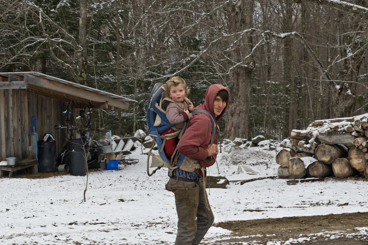 Last week's annoying snow falls provide a nice back drop to Ryan taking Sky to work, photo by Adam Ford