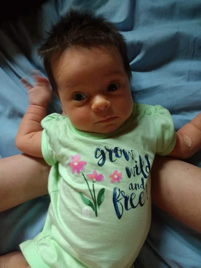 Hey everyone! I am one month old and I eat all the time! And you are correct, I have a wild amount of hair!