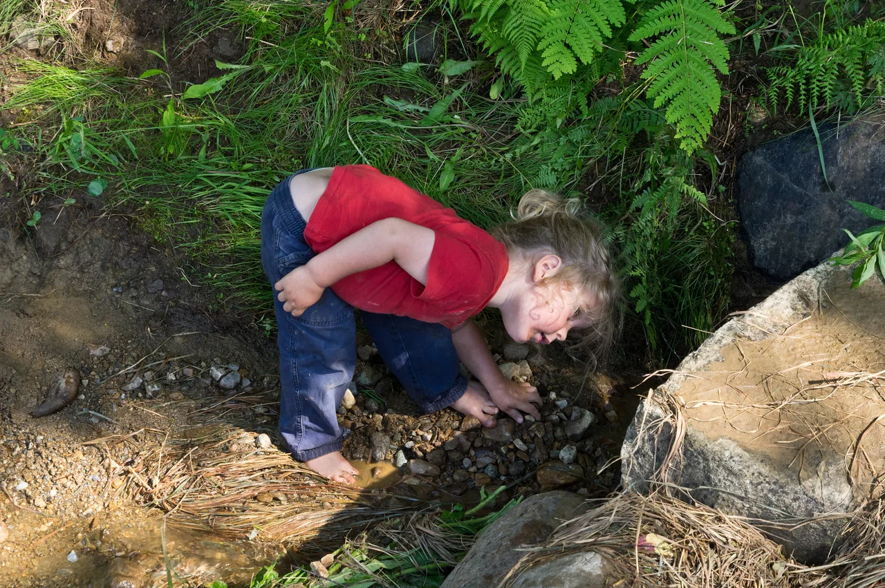 Sky pointing out the obvious: “gotta keep the culverts from clogging so they do their job, mama”, photo by Adam Ford