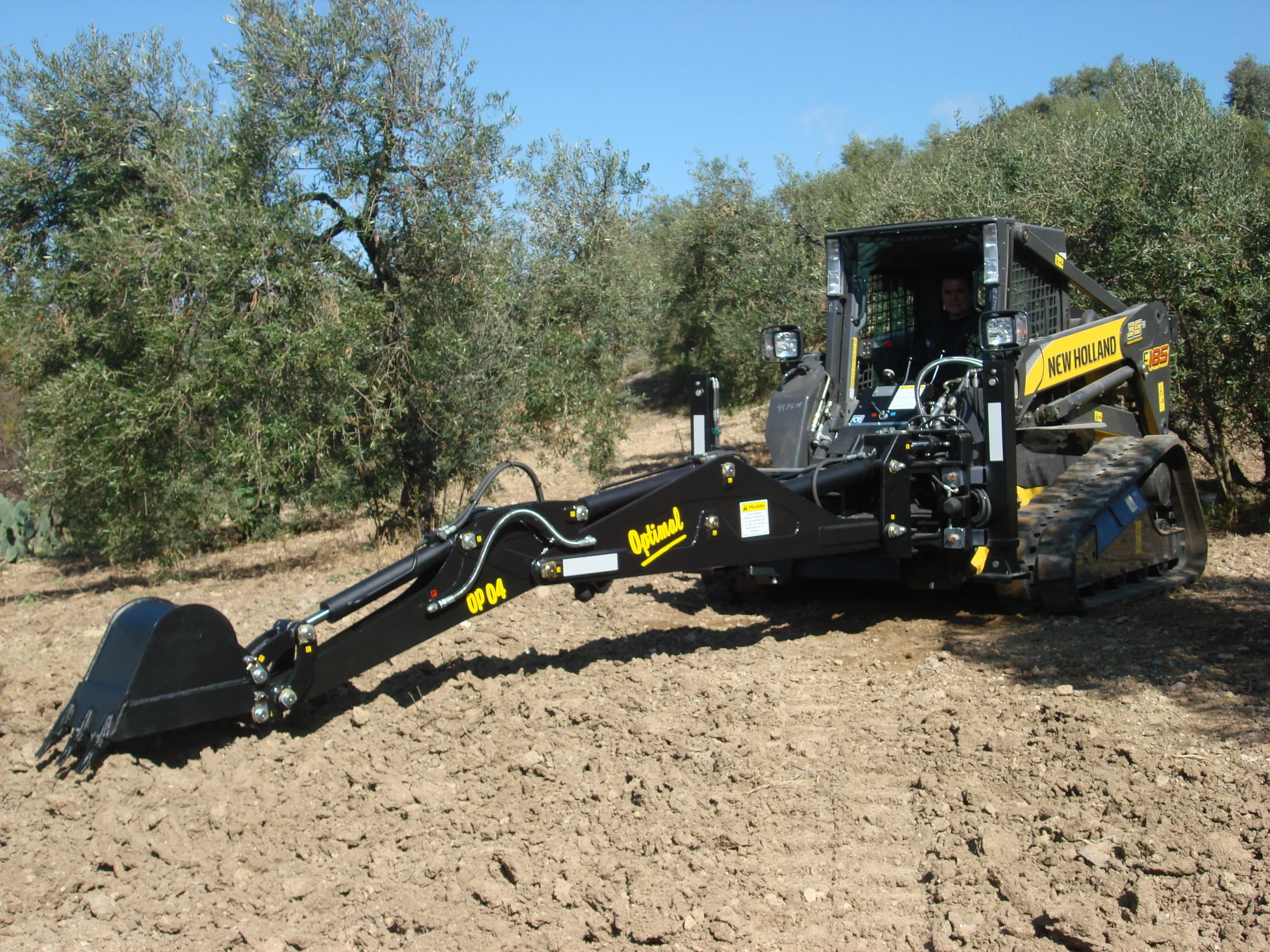 Backhoe_Skidsteer_New Holland C185_ OP04_1 cover.jpg