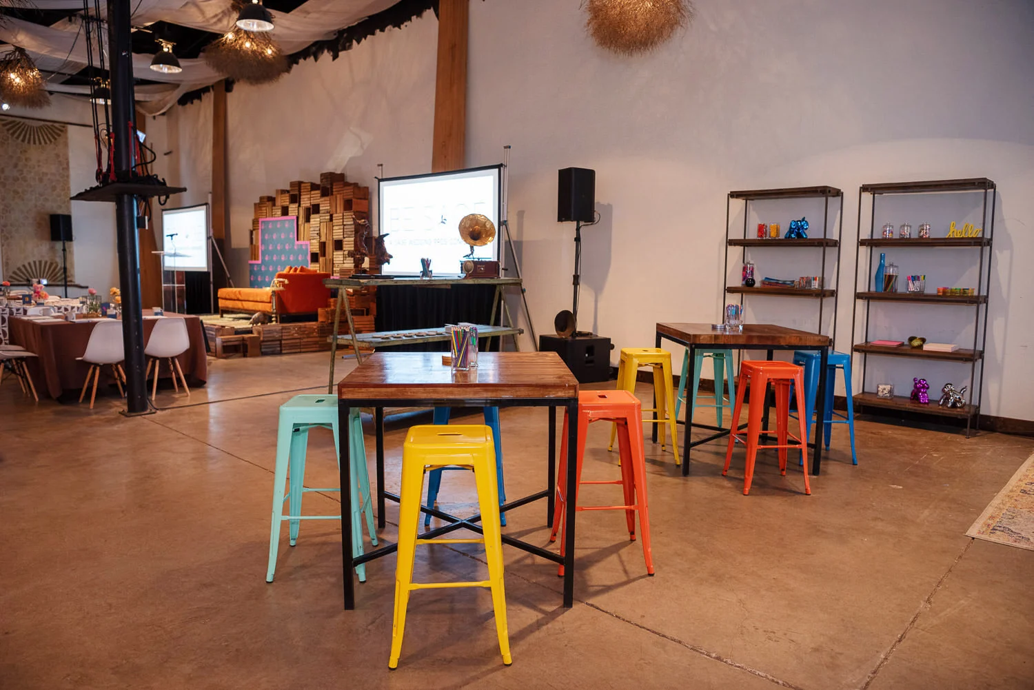  colorful metal stools seating at wedding conference 