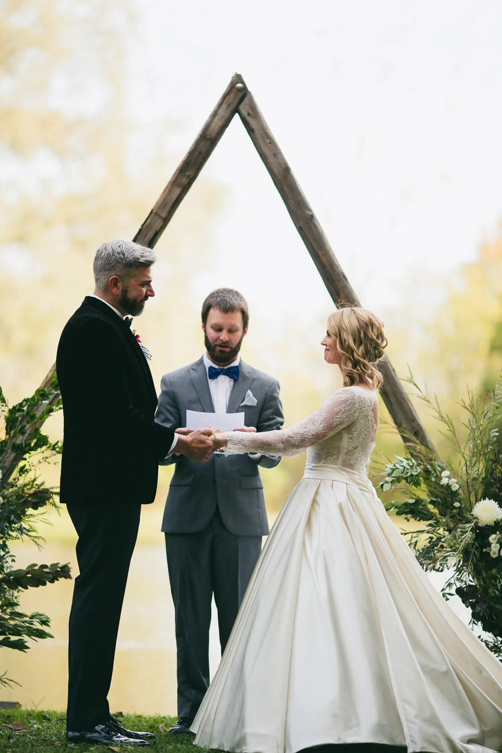  wedding ceremony in front of triangle altar 