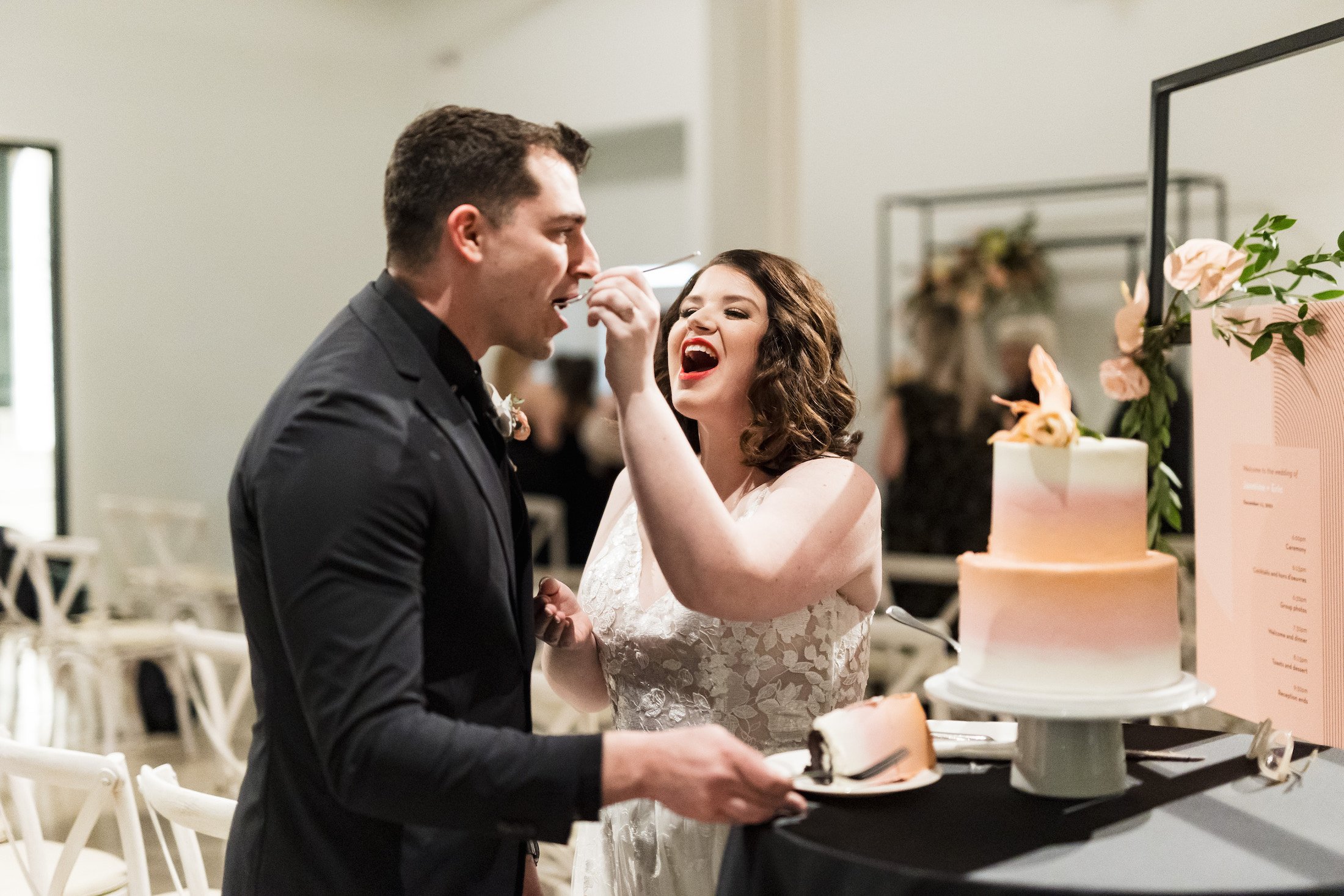 bride and groom eating cake .jpeg