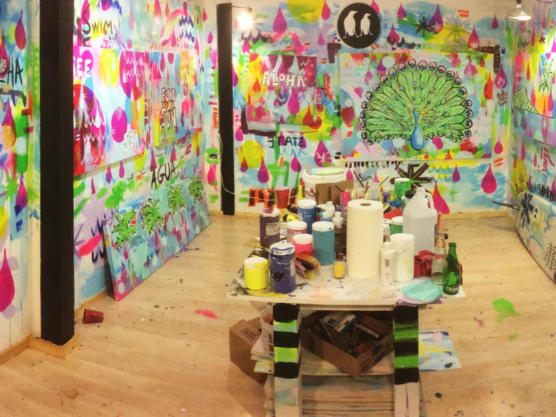 You can see here in the far corner of my studio a peacock still in the works. This one is on a huge canvas and still needs a few good days of painting to finish it up.