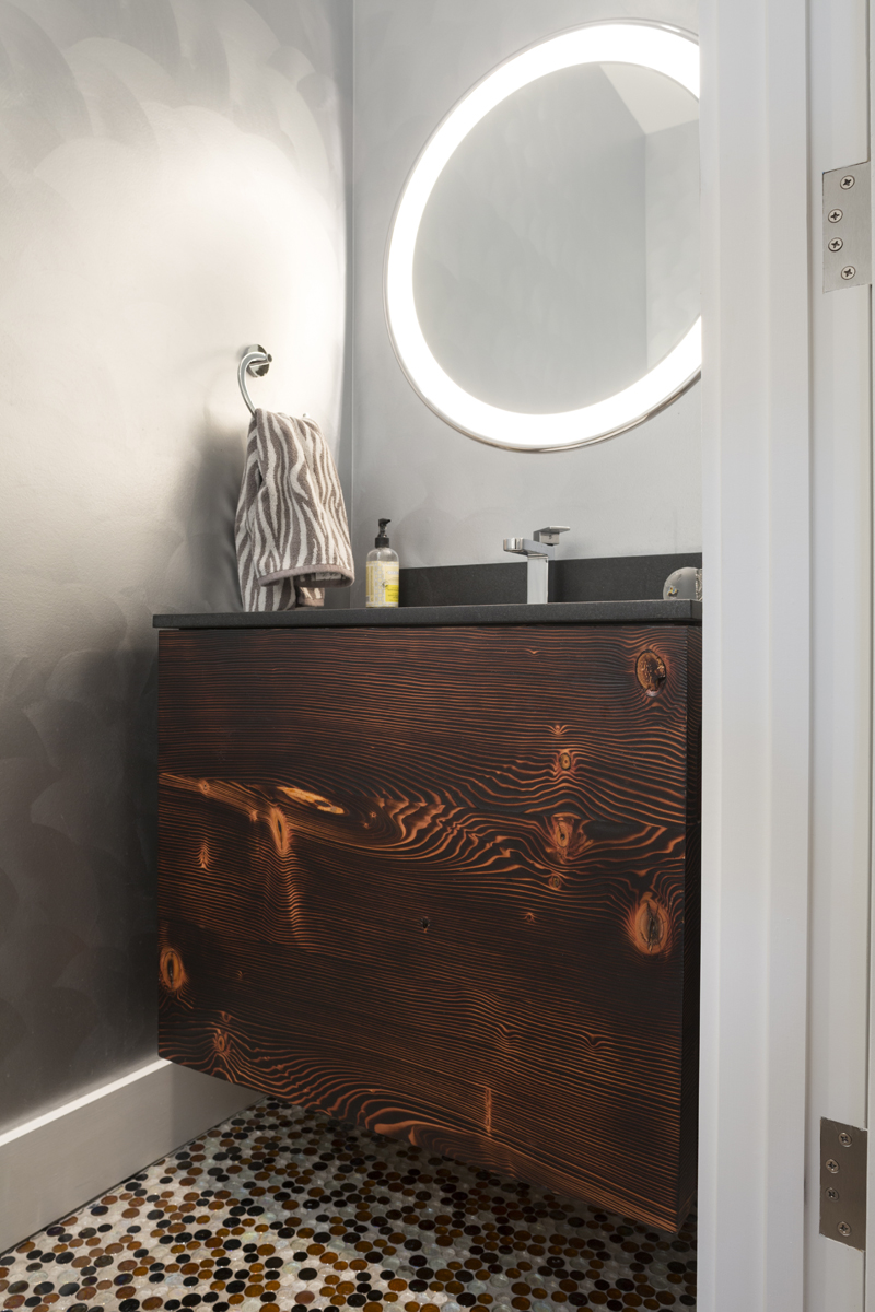 Charred Pine Vanity Reclaimed pine wall hanging vanity with flame charred finish.