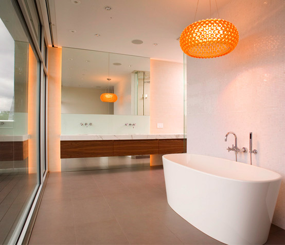 Fremont Master Bath Walnut veneered floating vanity with integrated U-shaped drawers.