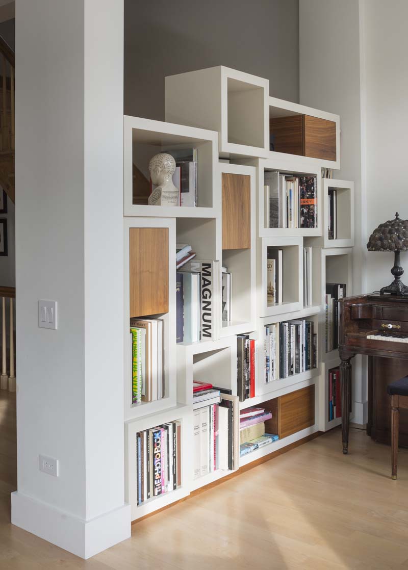 Potomac Room Divider Dull lacquered modular room divider/bookshelf with walnut veneered doors.