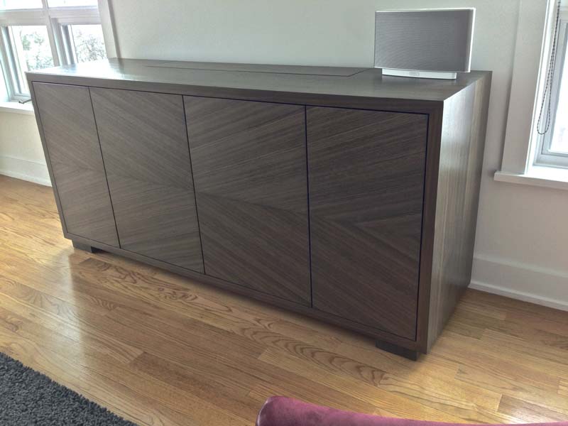 Reverse Diamond Media Cabinet Hidden TV cabinet with reverse diamond matched doors. Solid walnut case in "driftwood" stain and lacquer finish.