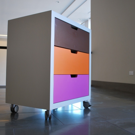 Tri-Color Storage Cart Painted MDF double sided storage cart with locking castors.
