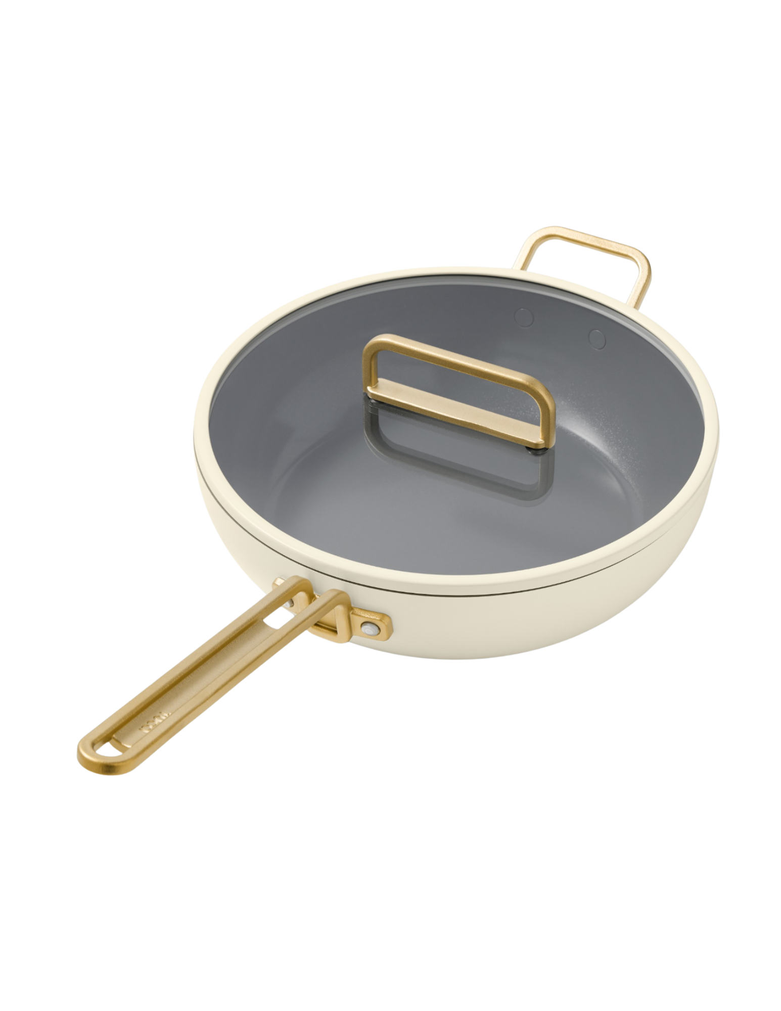 Round beige frying pan with a gray cooking surface and gold-colored handles.