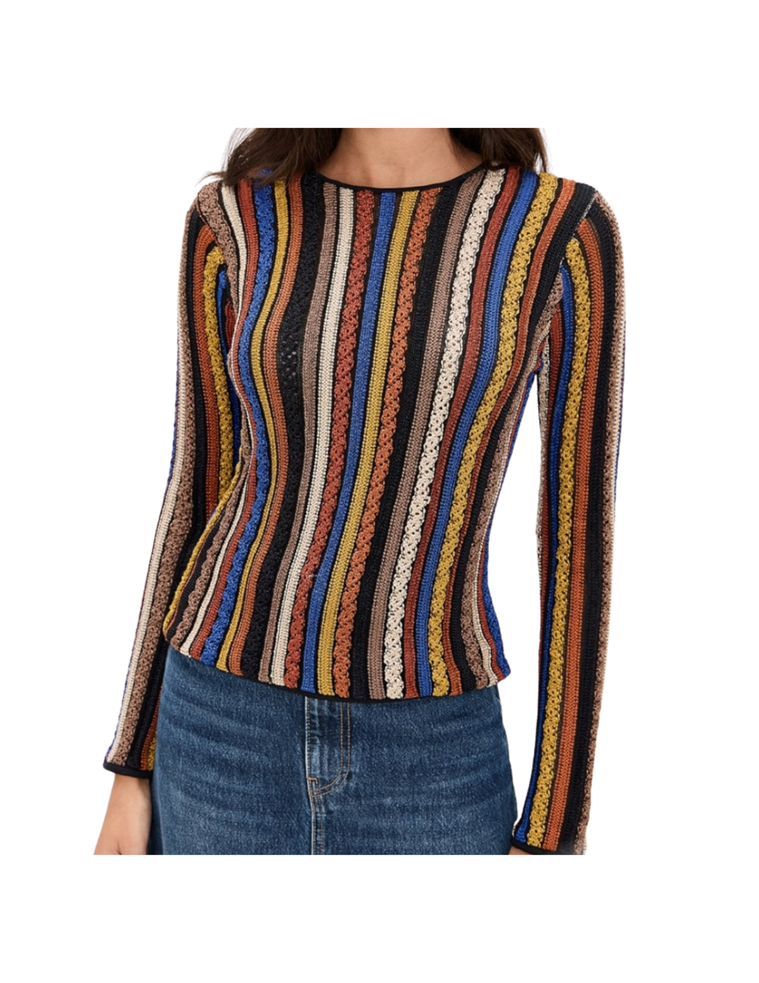 A woman wearing a long-sleeve, colorful, striped patterned sweater and jeans.