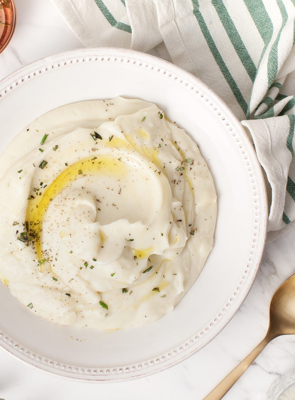 Cauliflower Parsnip Mash with Roasted Garlic via Love & Lemons