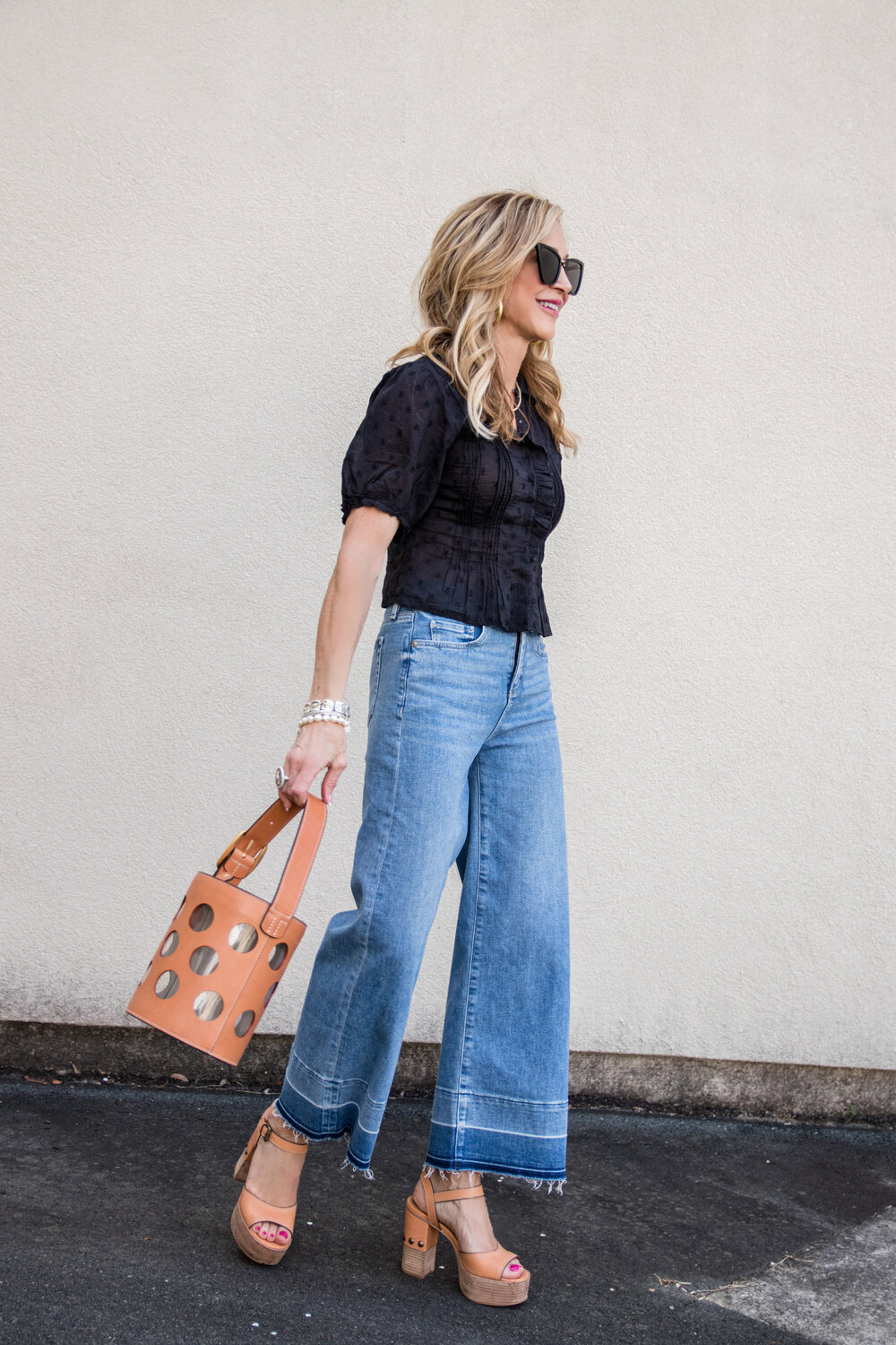 Wearing High Flare Denim With a Cropped Blonde Life