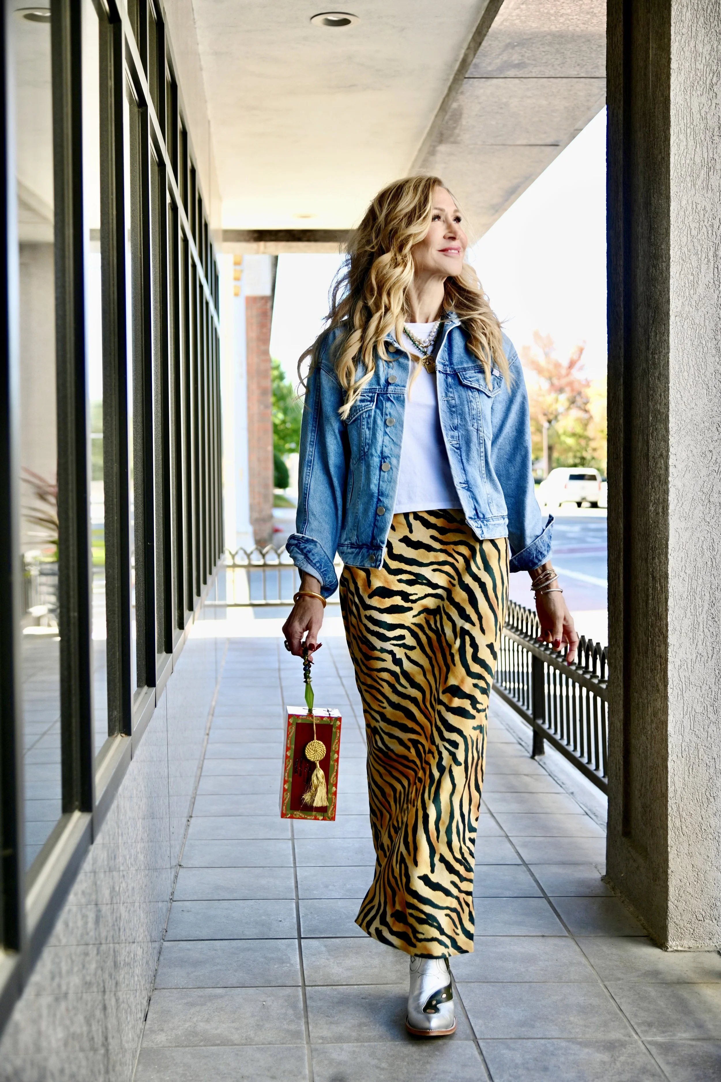   This is one of my favorite looks from fall of last year!  It just kind of came together effortlessly.  The vintage cigar box bag and cowboy boots add so much interest and personality to this look!  As soon as the weather gets warmer, I have big plans for this skirt from     Hunter Bell    !  My cowboy boots are from     Fraulein    .  